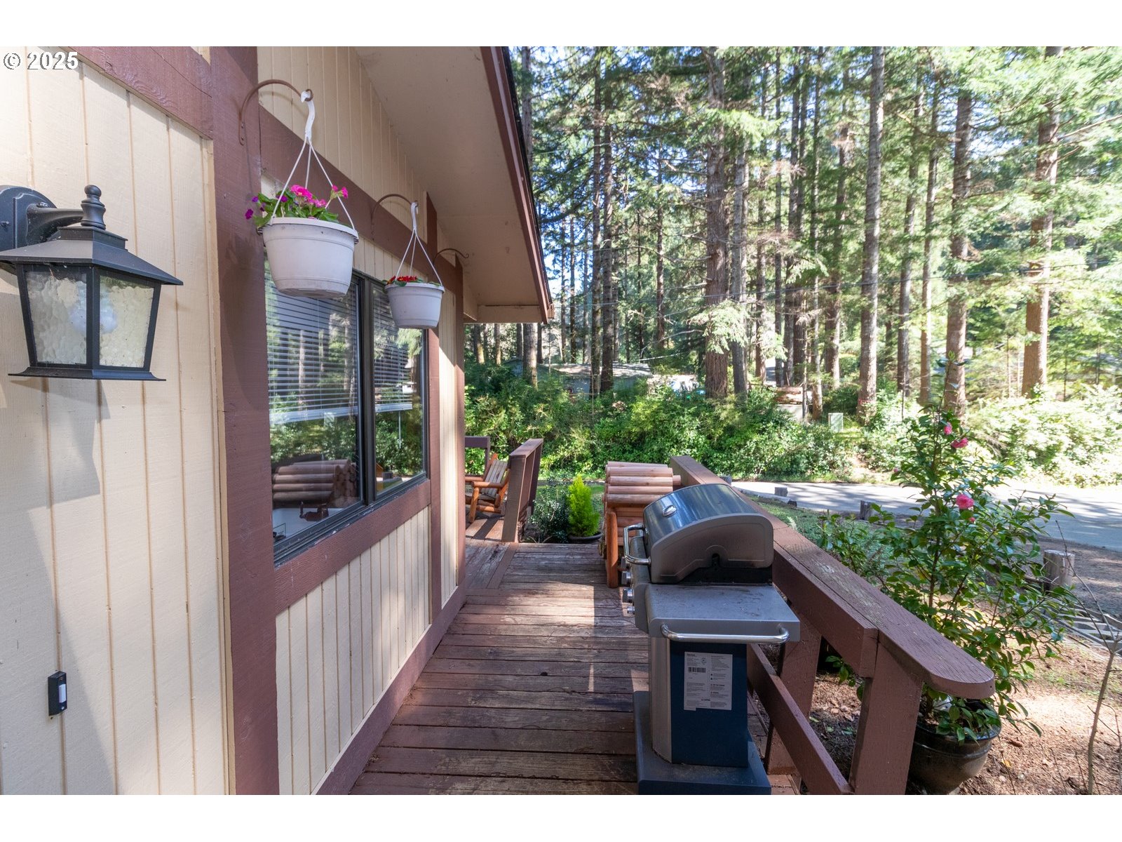 83694 Erhart Road Florence, OR 97439 - Photo 26 of 31 a backyard of a house with table and chairs