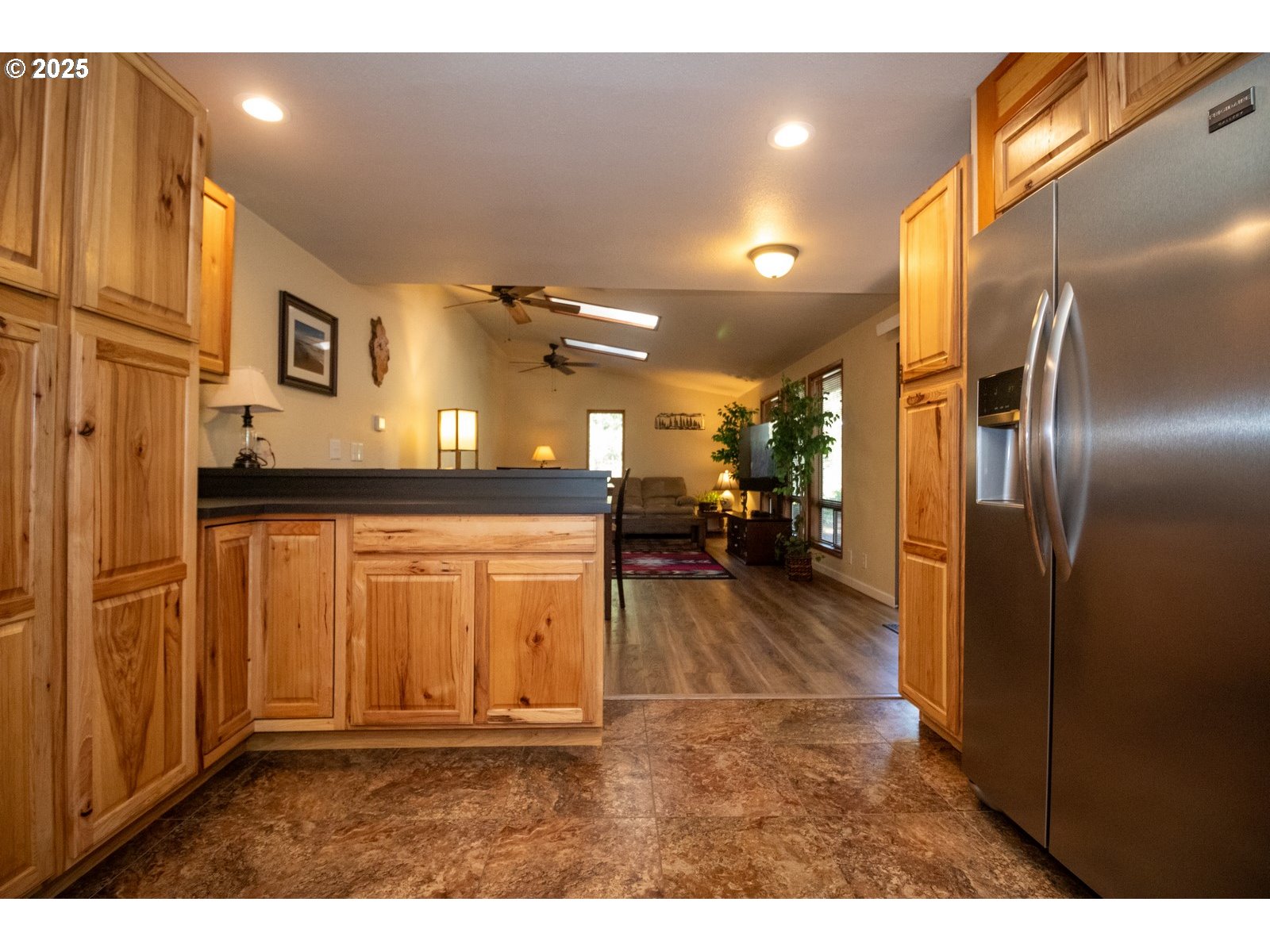 83694 Erhart Road Florence, OR 97439 - Photo 6 of 31 a view of a hallway with wooden floor