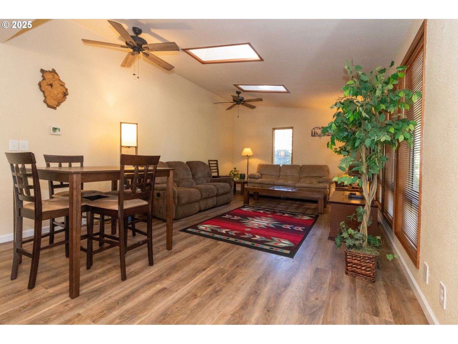 83694 Erhart Road Florence, OR 97439 - Photo 8 of 31 a living room with furniture and a potted plant