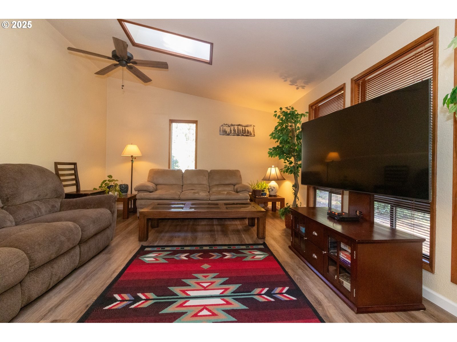 83694 Erhart Road Florence, OR 97439 - Photo 9 of 31 a living room with furniture and a flat screen tv
