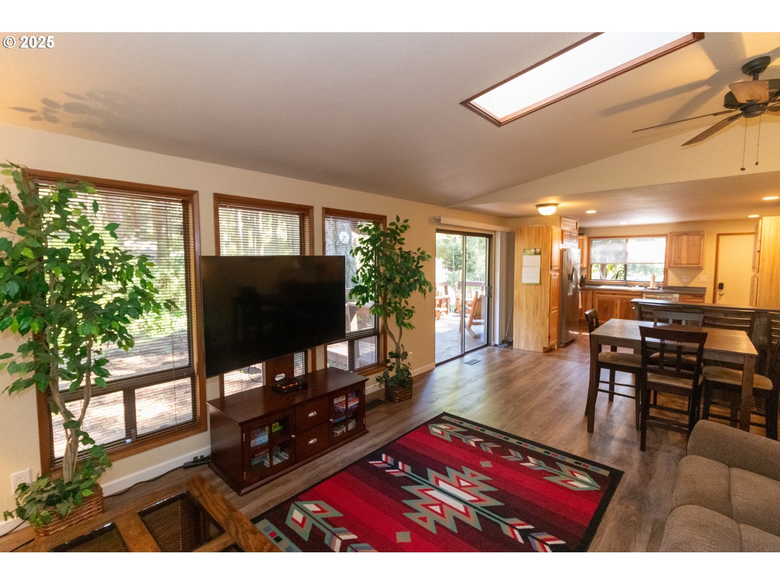 83694 Erhart Road Florence, OR 97439 - Photo 10 of 31 a living room with furniture and a flat screen tv