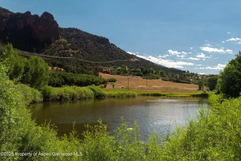 a view of a lake in middle of the town