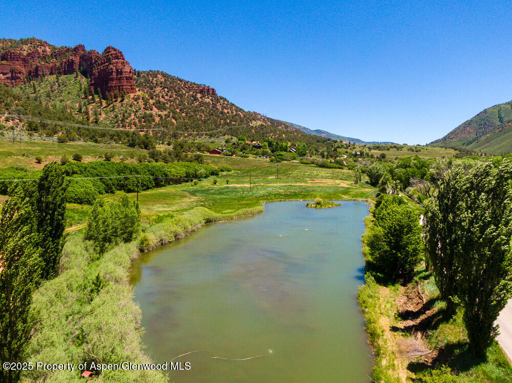 5045 Frying Pan Road Basalt, CO 81621 - Photo 5 of 22 a view of a lake with a mountain in the background