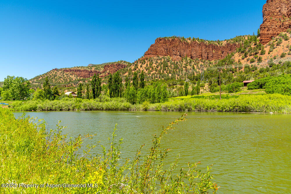 5045 Frying Pan Road Basalt, CO 81621 - Photo 6 of 22 a view of an ocean with a mountain in the background