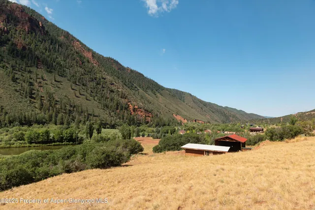 a view of a road with a yard