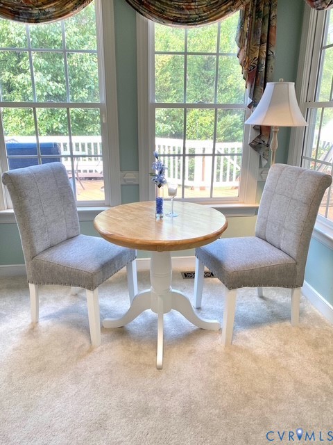 14307 Abbots Ridge Court Midlothian, VA 23113 - Photo 7 of 16 a dining room with furniture and a large window