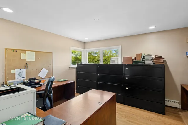 a kitchen with a wooden cabinets and a stove top oven