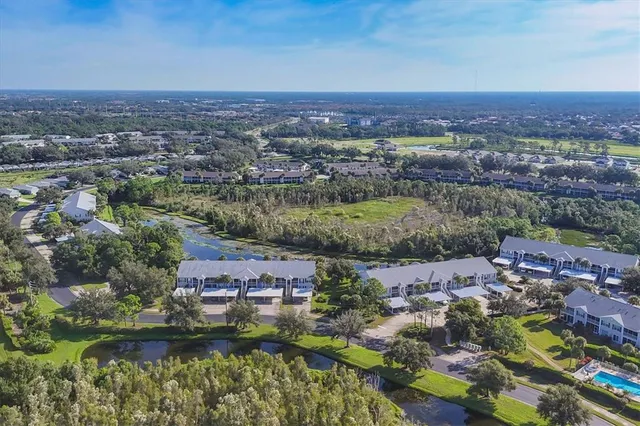 an aerial view of a city with lots of residential buildings