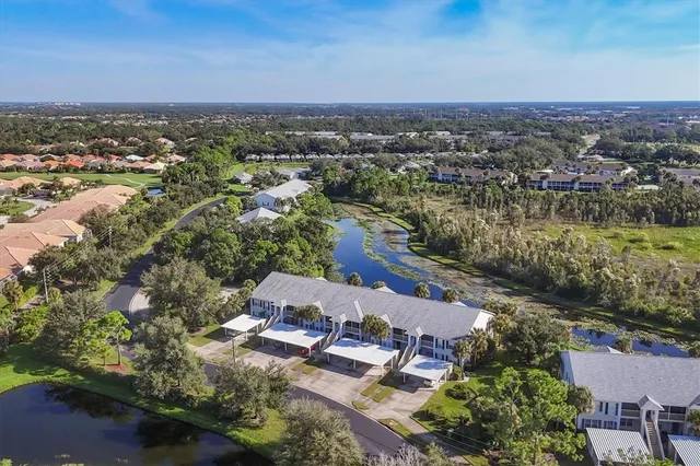an aerial view of a house with a garden