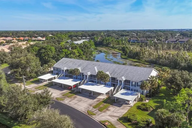 a view of swimming pool with outdoor seating
