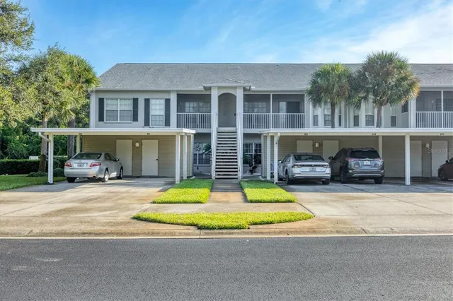 a backyard of a house with seating space