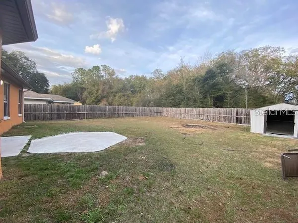 a view of outdoor space and yard
