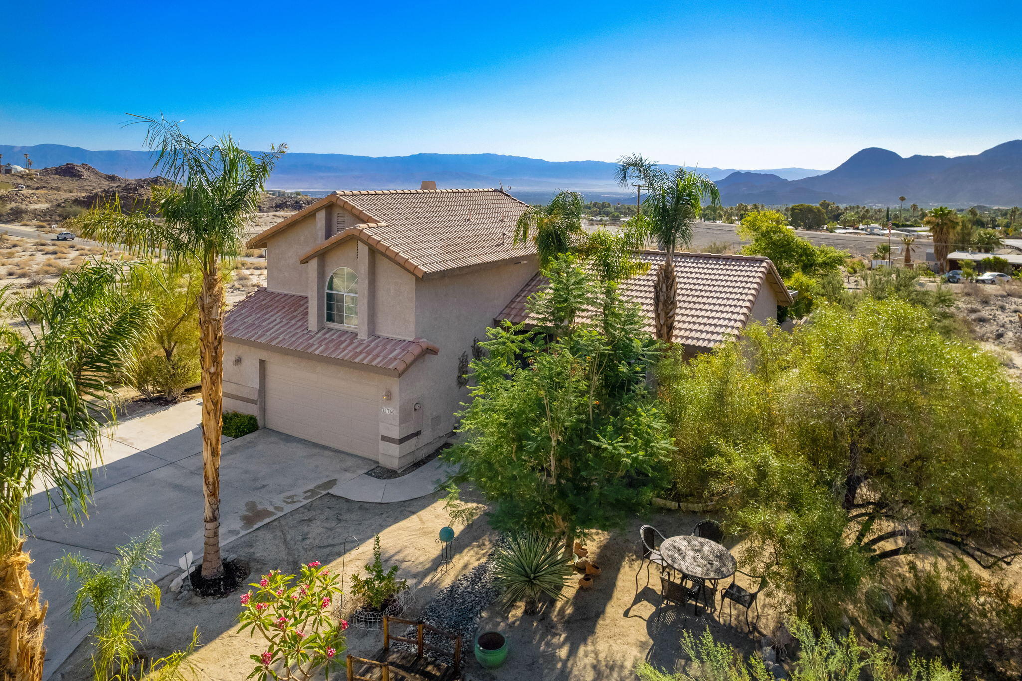 71750 Cholla Way Palm Desert, CA 92260 - Photo 39 of 42 a view of a house with a yard