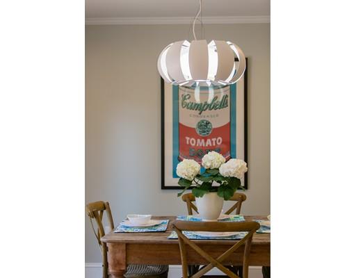 909 Lowell Road Concord, MA 01742 - Photo 4 of 28 a dining room filled with furniture and chandelier