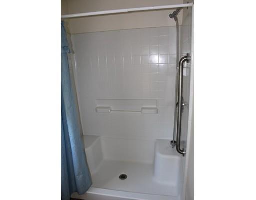 157 Old Coldbrook Road Barre, MA 01005 - Photo 14 of 21 a bathroom with a glass shower door