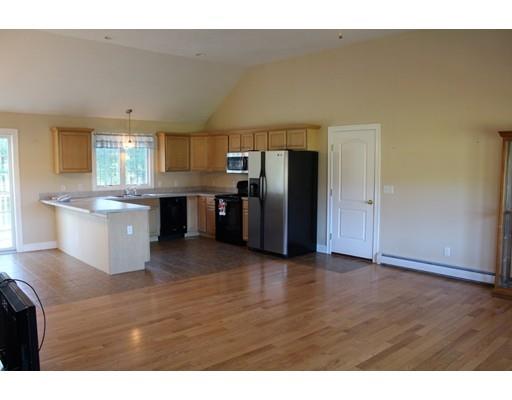 157 Old Coldbrook Road Barre, MA 01005 - Photo 4 of 21 a kitchen with stainless steel appliances a refrigerator sink and cabinets