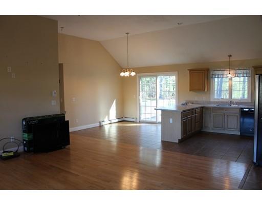 157 Old Coldbrook Road Barre, MA 01005 - Photo 8 of 21 a view of a kitchen with furniture and wooden floor