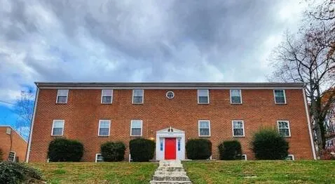 a front view of a house with yard