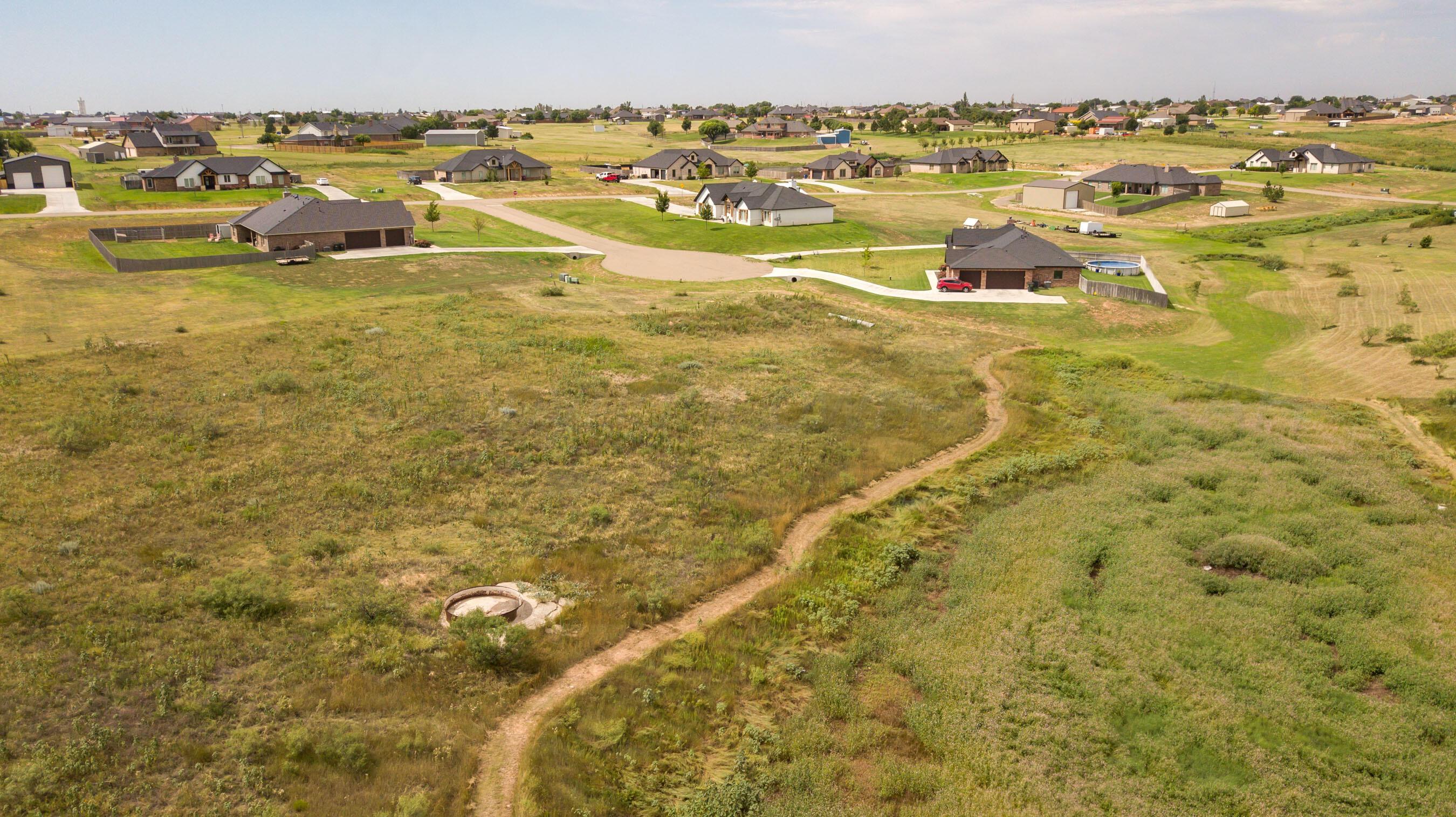0 Brindle Amarillo, TX 79124 - Photo 7 of 13 a view of a swimming pool with an ocean view