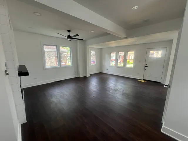 a view of cabinets and wooden floor