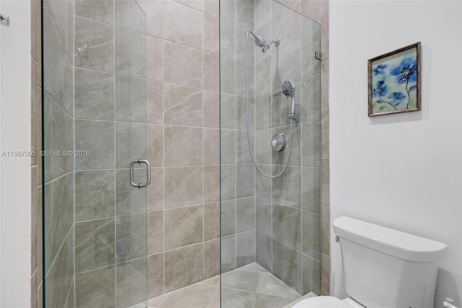 2751 Northwest 70th Boulevard Boca Raton, FL 33496 - Photo 41 of 90 a bathroom with a shower