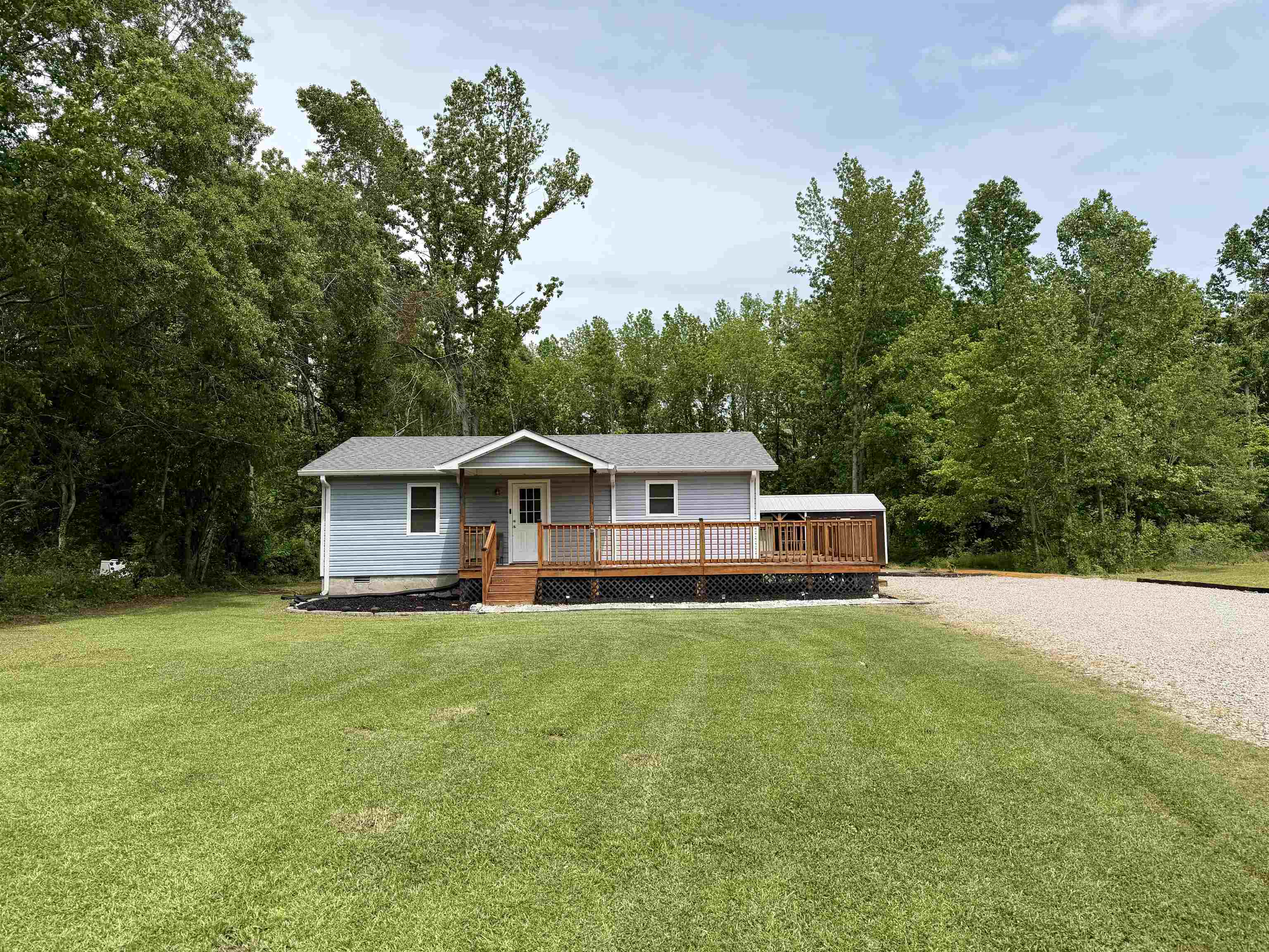 8022 45th Highway Ramer, TN 38367 - Photo 19 of 20 a view of a house with a big yard
