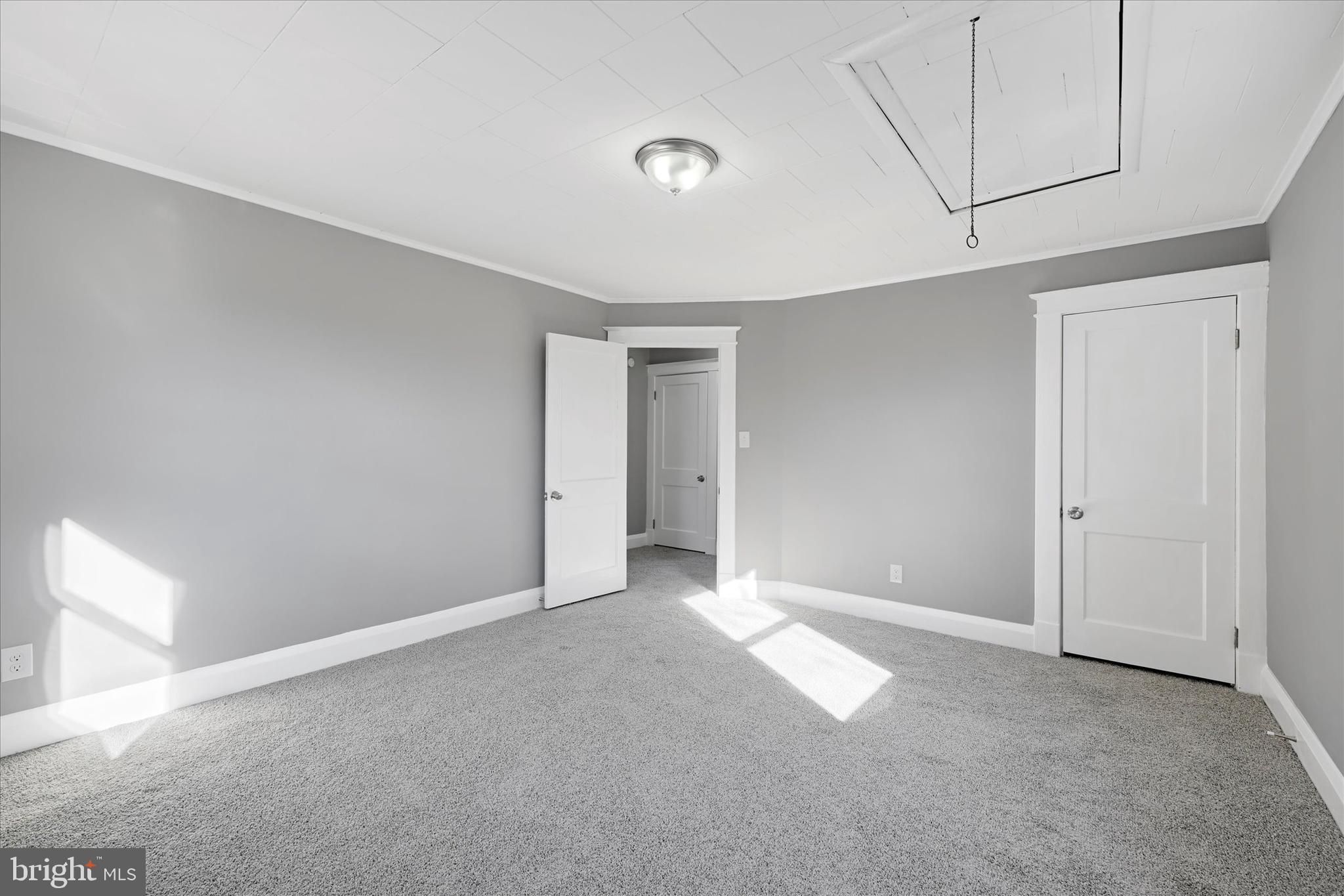 6113 Sefton Avenue Baltimore, MD 21214 - Photo 15 of 25 a view of an empty room with a window