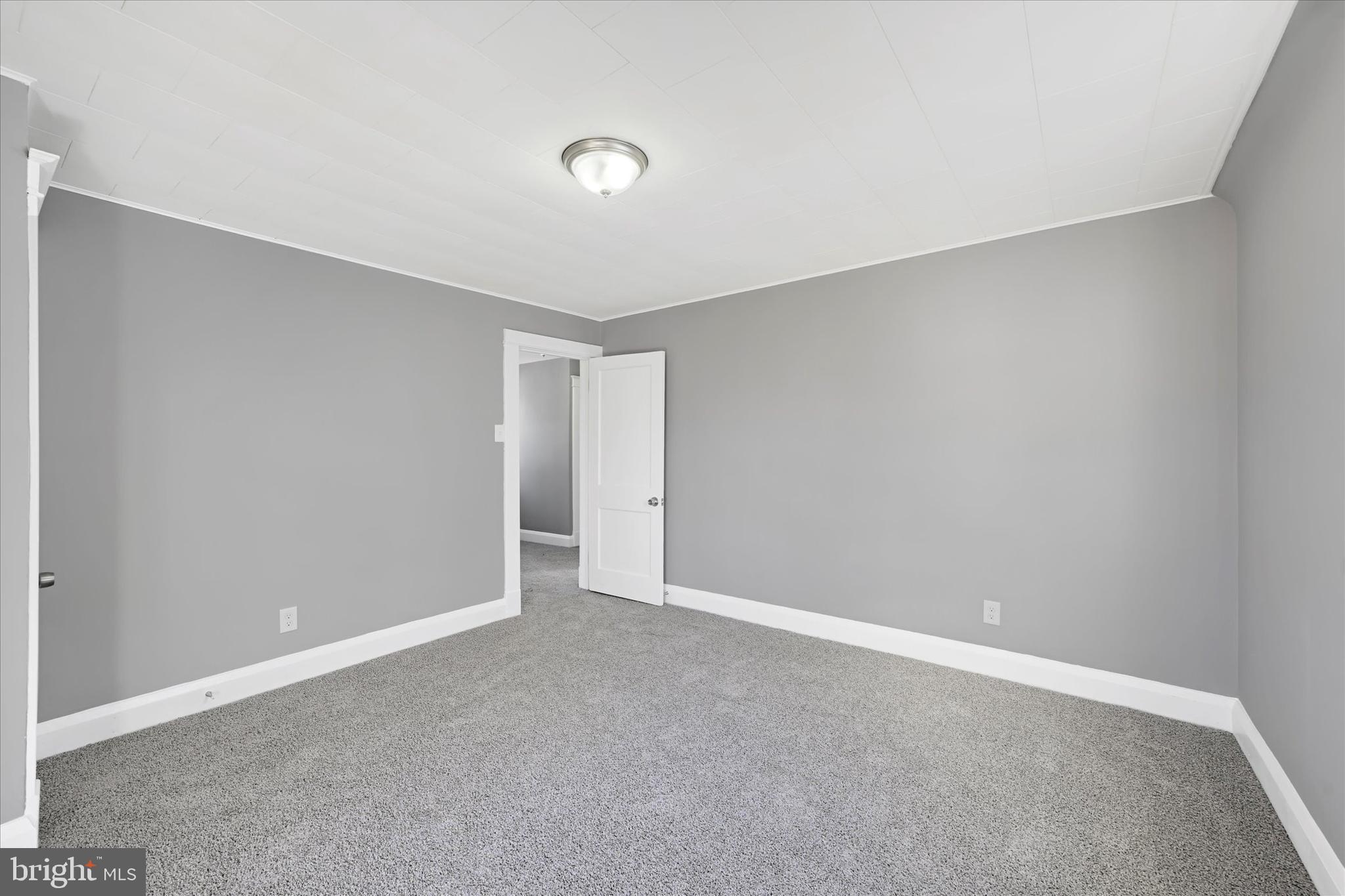 6113 Sefton Avenue Baltimore, MD 21214 - Photo 16 of 25 a view of an empty room