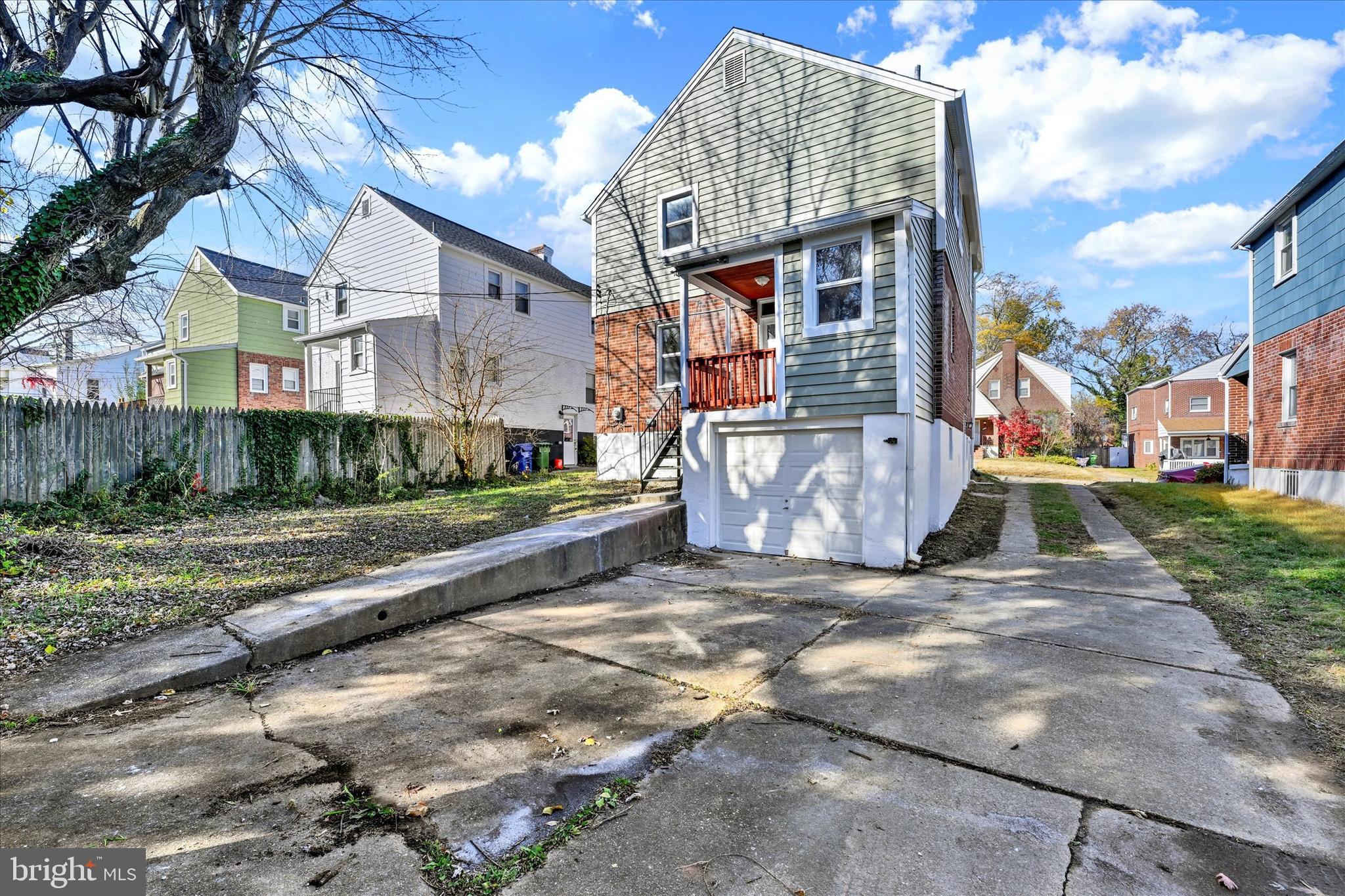 6113 Sefton Avenue Baltimore, MD 21214 - Photo 24 of 25 a view of a street with brick building in the background