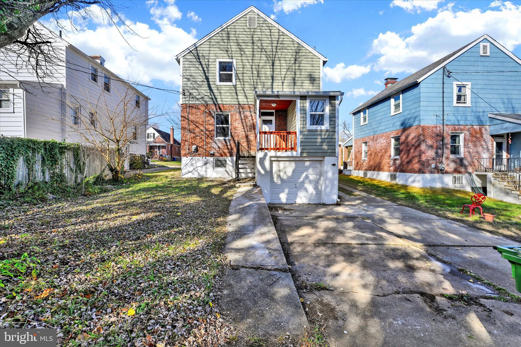 6113 Sefton Avenue Baltimore, MD 21214 - Photo 25 of 25 a view of a house with a patio