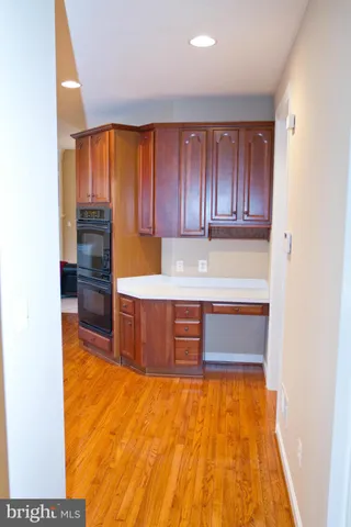 a kitchen with stainless steel appliances granite countertop a granite counter tops and a view of kitchen