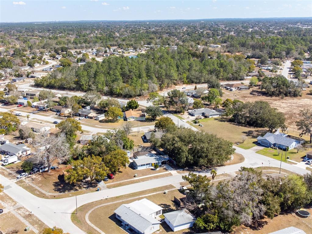 9381 Rosa Street Spring Hill, FL 34608 - Photo 26 of 26 an aerial view of a city