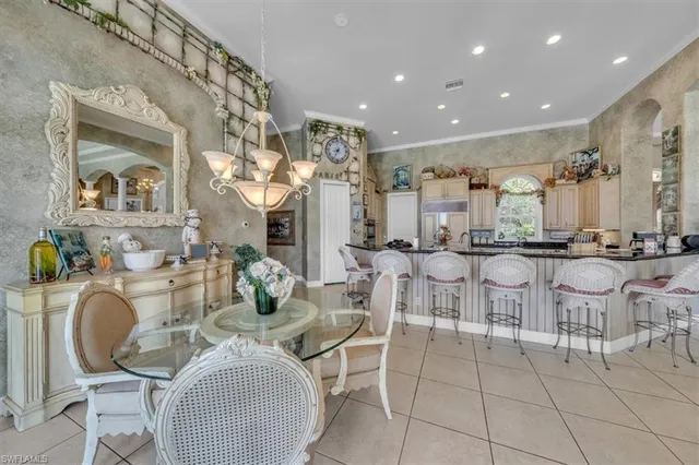 a very nice looking dining room with furniture