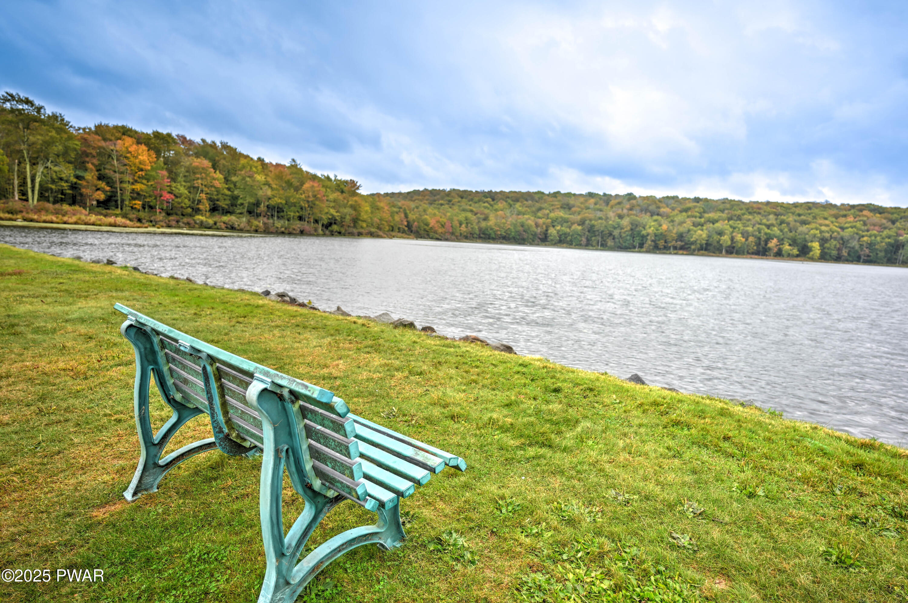 42 Beaver Pond Road Lake Ariel, PA 18436 - Photo 66 of 77 a view of swimming pool with lake and mountain in the back