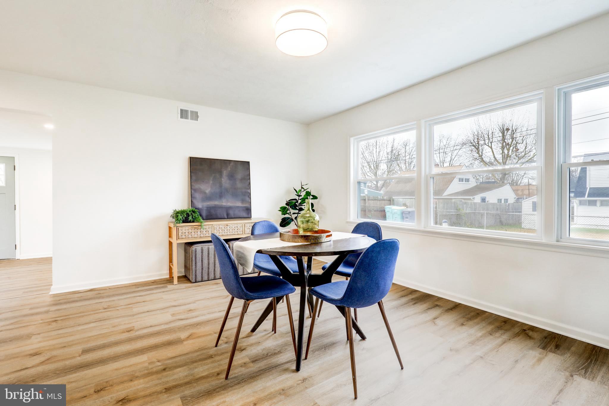 31 Nature Lane Levittown, PA 19054 - Photo 11 of 33 a view of a dining room with furniture window and outside view