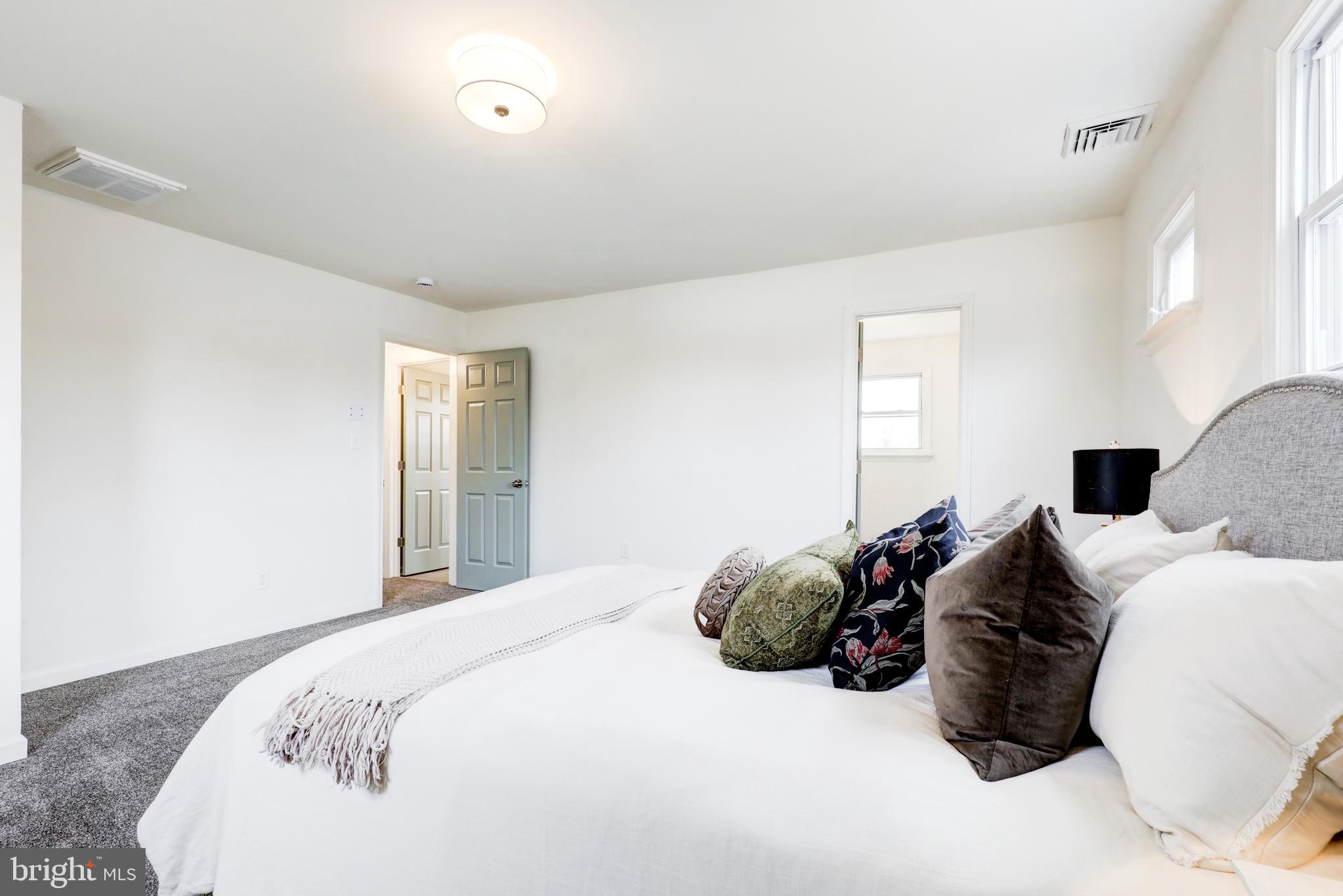 31 Nature Lane Levittown, PA 19054 - Photo 19 of 33 a bedroom with a bed with closet