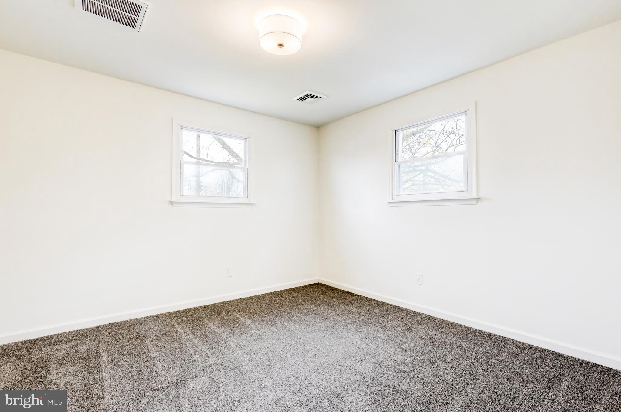31 Nature Lane Levittown, PA 19054 - Photo 27 of 33 an empty room with windows