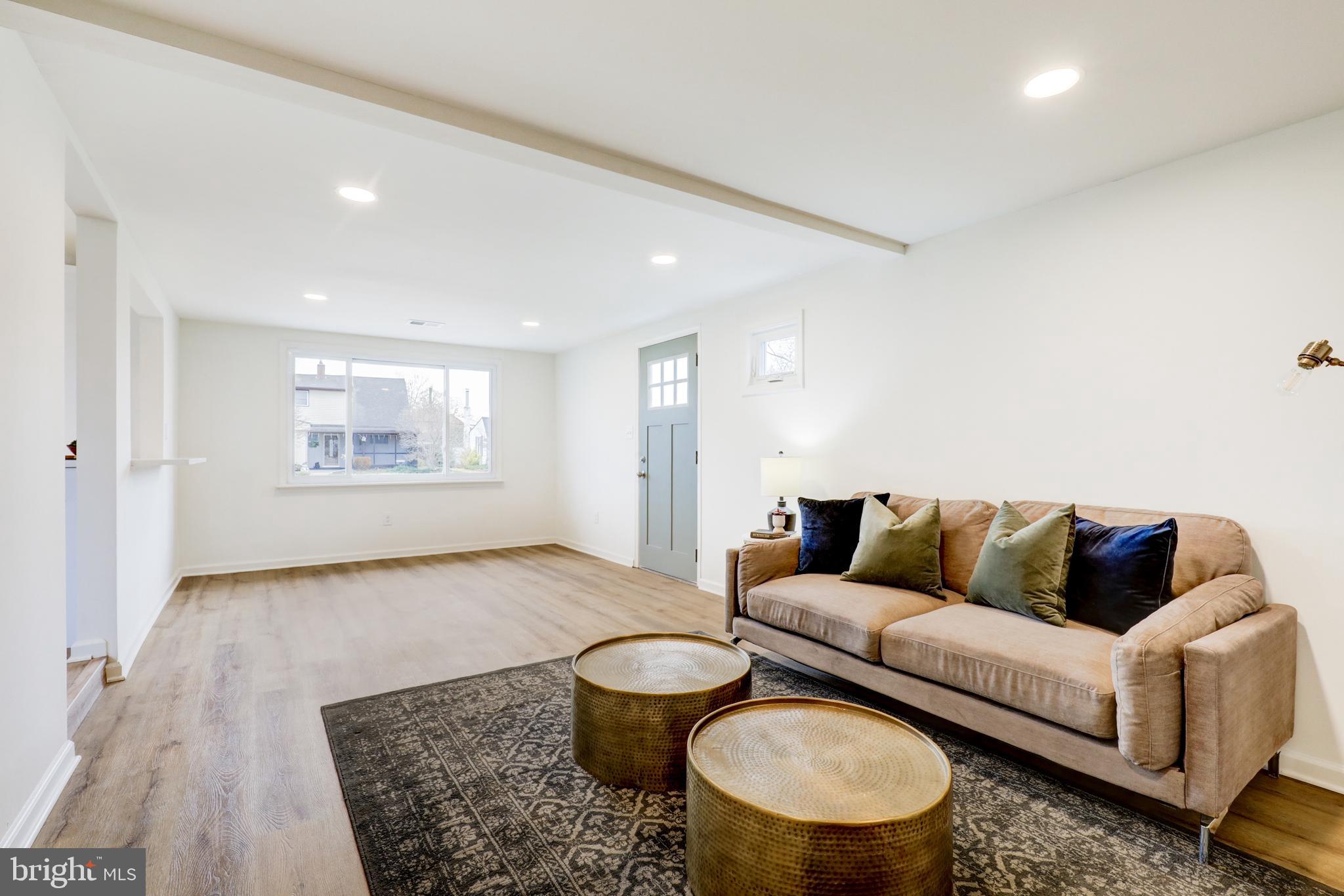 31 Nature Lane Levittown, PA 19054 - Photo 4 of 33 a living room with furniture and a rug