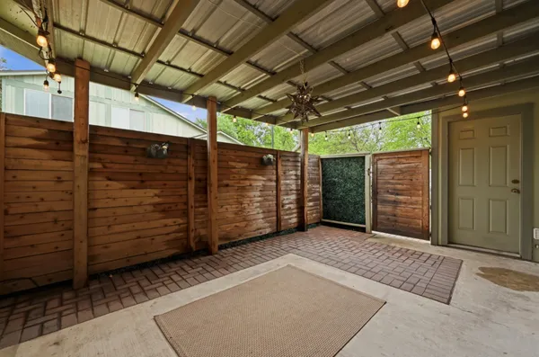 a view of a room with wooden walls