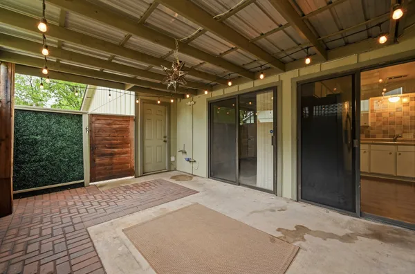a view of a hallway with an empty room