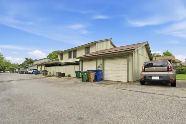 a car parked in front of a house