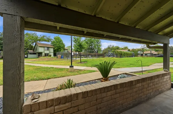 a view of a porch with garden