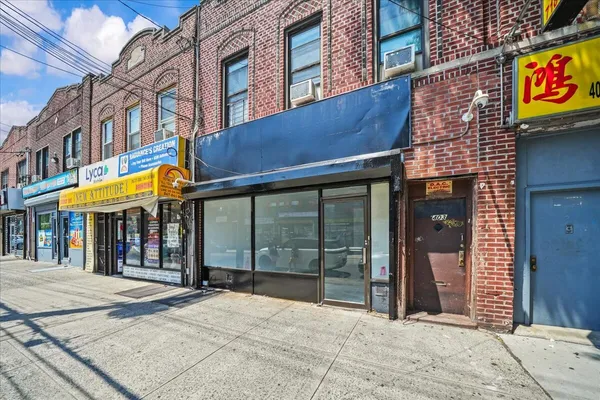 a view of a brick building with a large window