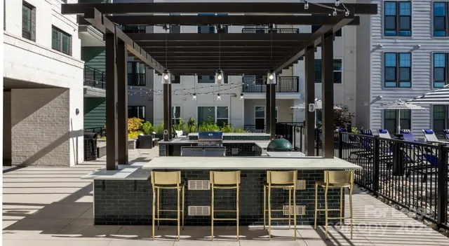 a view of a building with sitting area