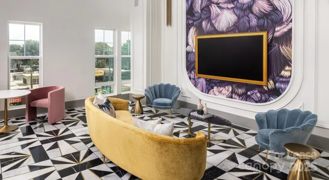 a living room with a couch and a flat screen tv