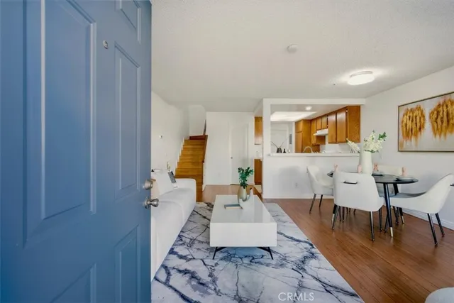 a living room with furniture and a table