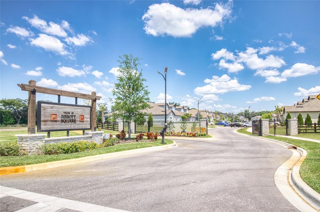 6736 Ripple Pond Loop Zephyrhills, FL 33541 - Photo 2 of 40 a view of a building with a street