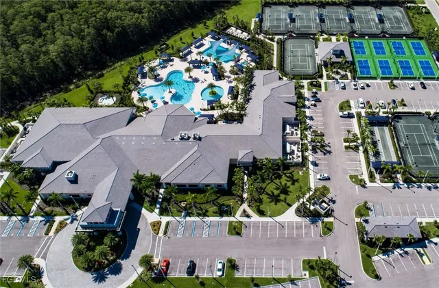 an aerial view of multiple houses with outdoor space