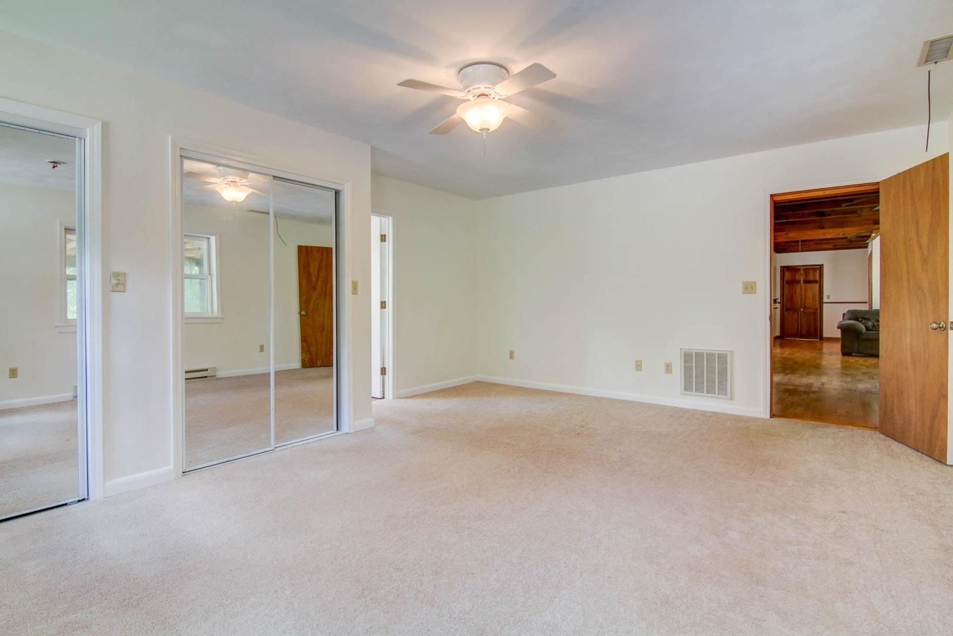 580 Mt Pleasant Church Road Fincastle, VA 24090 - Photo 12 of 39 an empty room with a bathroom and a shower