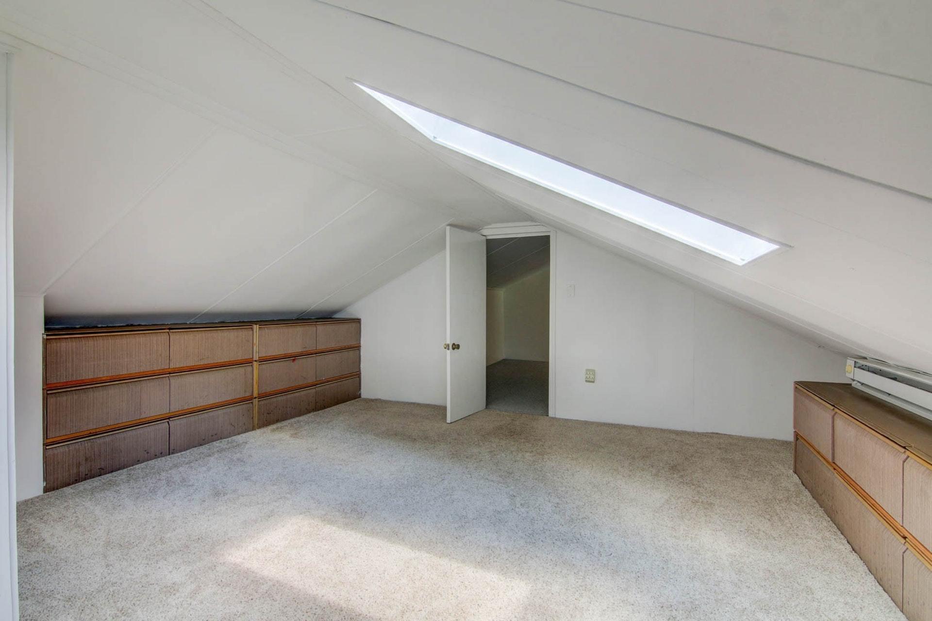 580 Mt Pleasant Church Road Fincastle, VA 24090 - Photo 26 of 39 a view of an empty room with cabinet and stairs